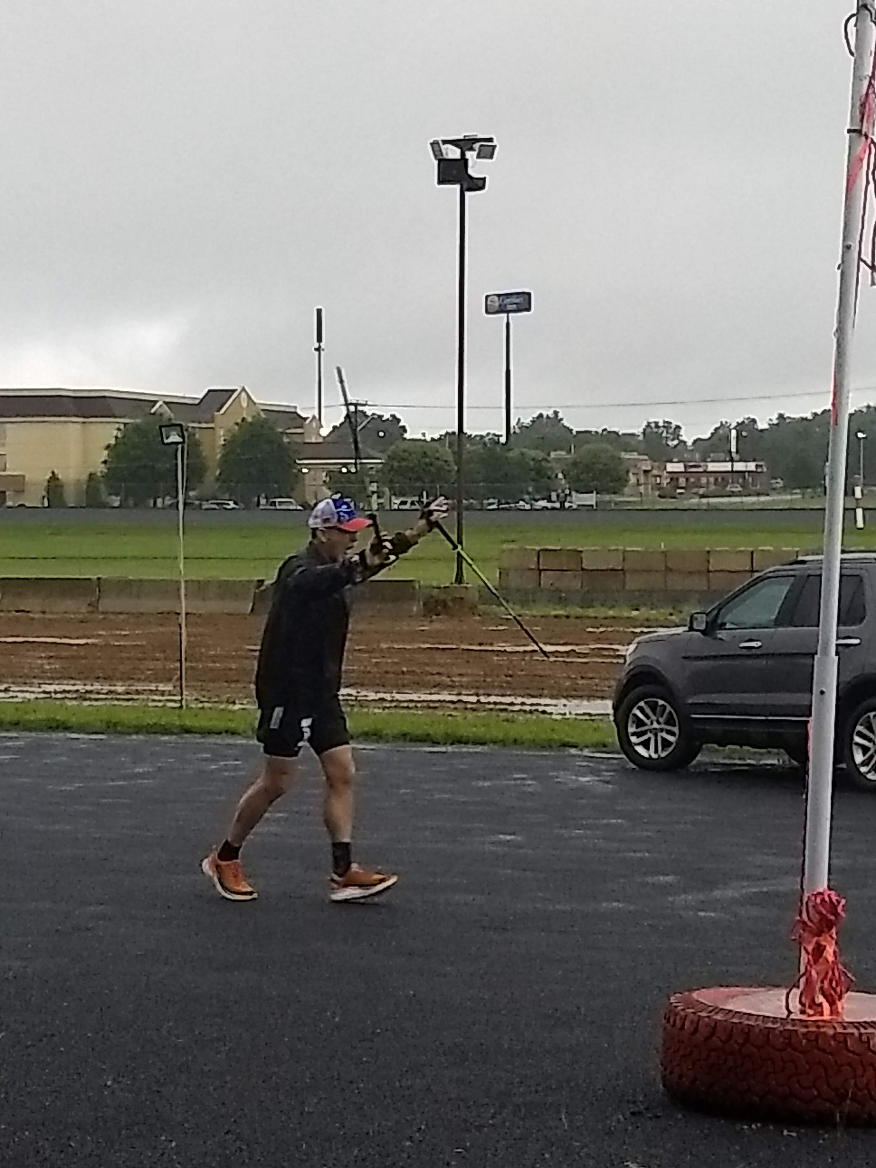 Jeff Stafford finishing with walking sticks